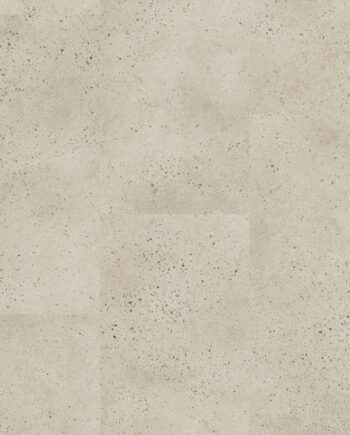 Vinyylilaatta Quick-Step Illume Oyster Concrete asennettuna modernin kodin lattialle – vaalea, lämmin harmaanbeige (oyster/greige) sävy ja pehmeä, hillitty betonikuviointi hienovaraisella kivimäisellä tekstuurilla.