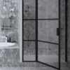 Hinged shower door with fixed part and wall magnet Hietakari Bläk 791 Tokyo, black frame, grey tinted glass Hinged shower door with fixed part and wall magnet Hietakari Bläk 791 Tokyo, black frame, grey tinted glass