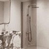 Folding shower screen Hietakari Forma 303, Mocha frame, bronze tinted glass Folding shower screen Hietakari Forma 303, Mocha frame, bronze tinted glass