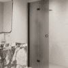 Folding shower screen Hietakari Forma 303, black frame, grey satin glass Folding shower screen Hietakari Forma 303, black frame, grey satin glass