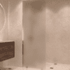 Partially framed fixed shower screen Hietakari Vetro 502, brass fittings, satin frosted glass Partially framed fixed shower screen Hietakari Vetro 502, brass fittings, satin frosted glass