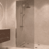 Framed shower screen with fixed part Hietakari Vetro 517, brass fittings, grey tinted glass Framed shower screen with fixed part Hietakari Vetro 517, brass fittings, grey tinted glass