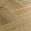 Herringbone laminate floor Quick-Step Impressive Design Charred Oak color and design description