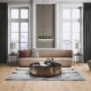 Engineered wooden flooring Bauwerk Boen Casapark Oak 46 Vivo brushed Avorio light oil-waxed installed on a living room floor. Classical modern mix stile with design sofa and chair. Nice design lightning. Marble top metallic side sofa table. Design carpet.