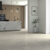 Stone-effect porcelain floor tile Tau Caribbean Light Beige, light beige, rectified – view 2 Stone-effect matt porcelain floor tile Tau Caribbean Light Beige, 60x60 cm, 9 mm, light beige, rectified – 2